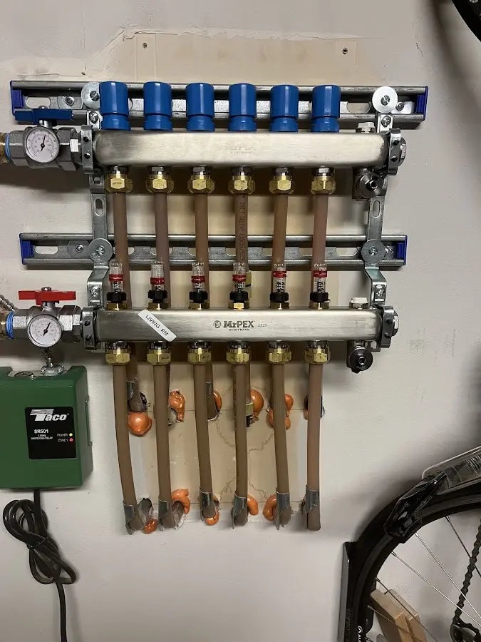 Plumber performing Gas Line Installation at a residential property in Vevay